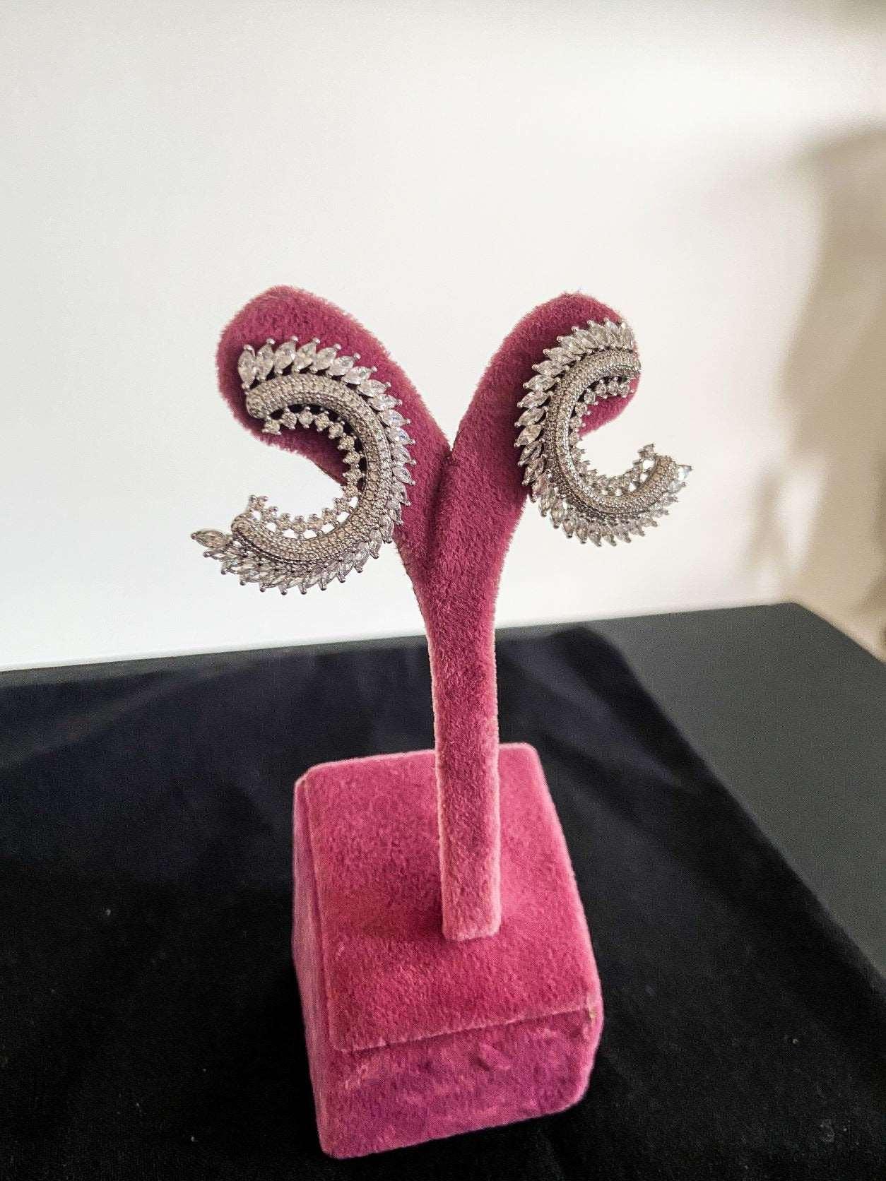 CC Silver Stud Earrings, 925 Sterling Silver CC Baguette Earrings, HanCC Silver Earrings Adorned with premium quality stones. These earrings, which are made of first quality using special zircon stones brought from Italy, are designed CC Silver Stud Earrings