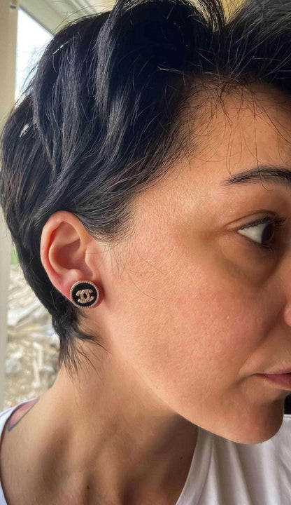 Enamel Chanel vintage rose gold earrings with sterling silver and baguette stones worn on ear