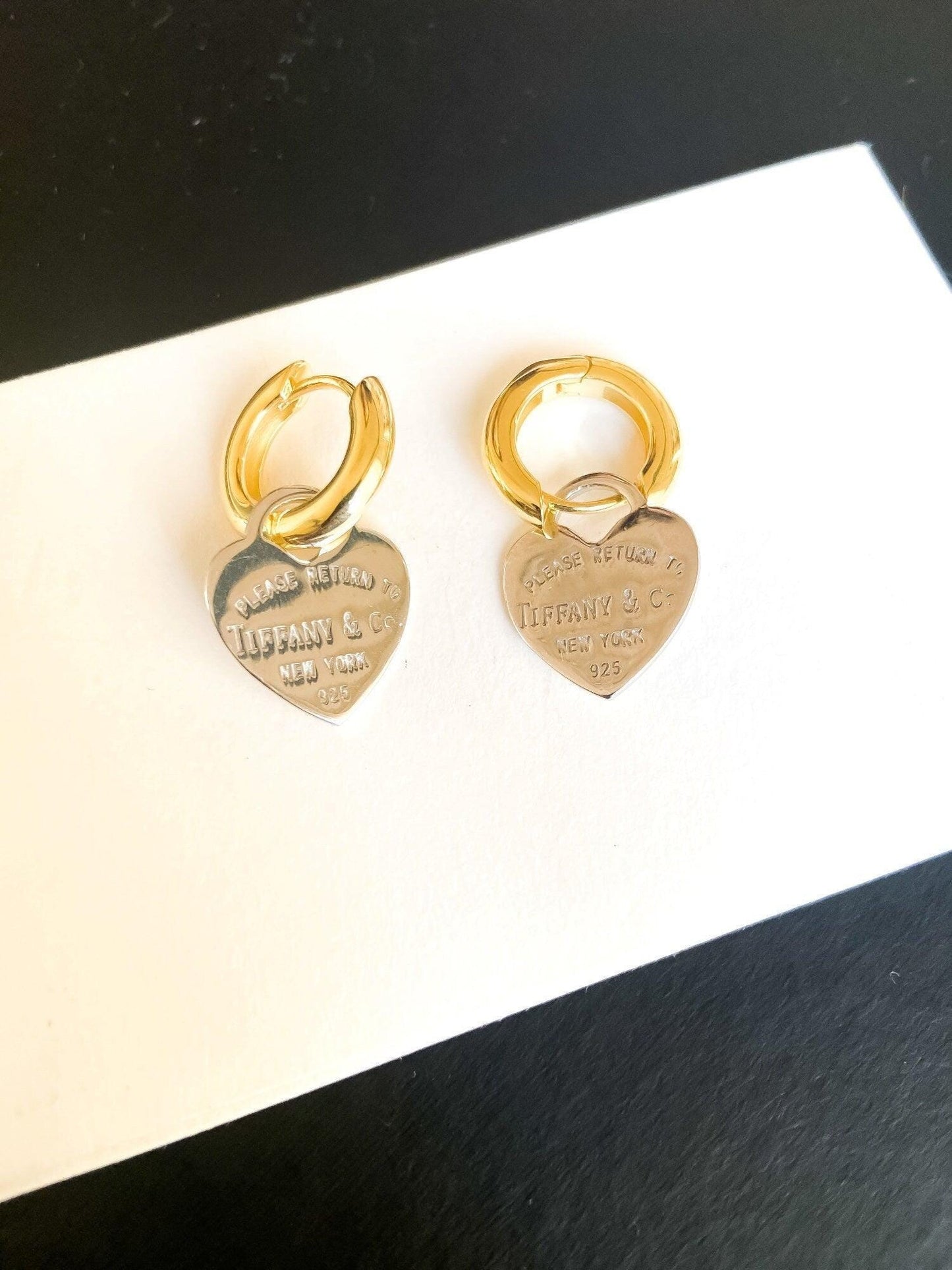 925 Sterling Silver Tiffany & Co Gold Planet Jewelry Heart Earrings on display with a white background.