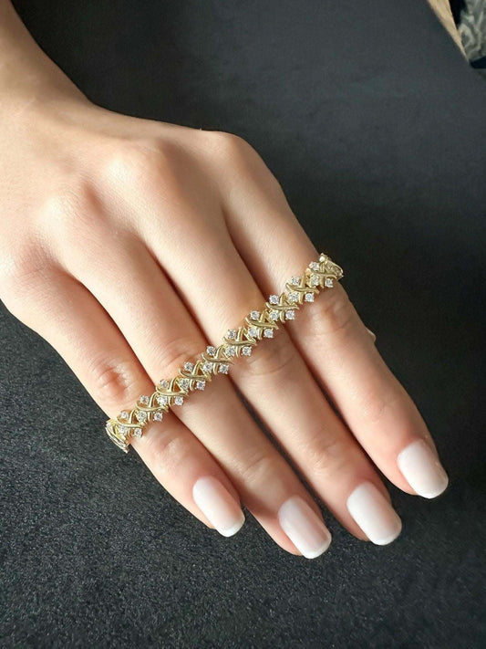 Tiffany & Co 22K gold and 925 sterling silver luxury bracelet with zircon stones on hand