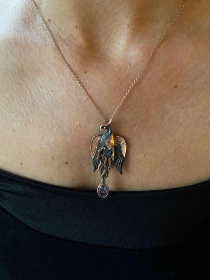 Amethyst Stone Fire Bird Pendant, Custom Desing Phoenix 925 Sterling SAmethyst Gemstone Our phoenix is ​​925 sterling silver and it is completely handcrafted. The eyes you see on it are decorated with red emeralds. It is specially desiAmethyst Stone Fire Bird Pendant