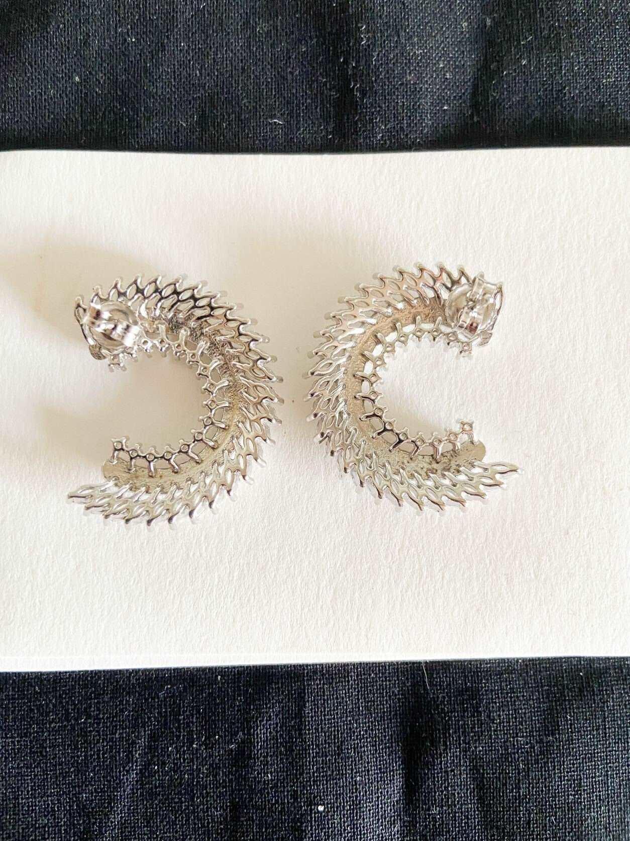 CC Silver Stud Earrings, 925 Sterling Silver CC Baguette Earrings, HanCC Silver Earrings Adorned with premium quality stones. These earrings, which are made of first quality using special zircon stones brought from Italy, are designed CC Silver Stud Earrings