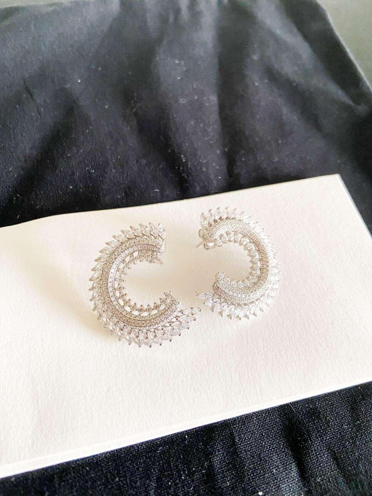 CC Silver Stud Earrings, 925 Sterling Silver CC Baguette Earrings, HanCC Silver Earrings Adorned with premium quality stones. These earrings, which are made of first quality using special zircon stones brought from Italy, are designed CC Silver Stud Earrings