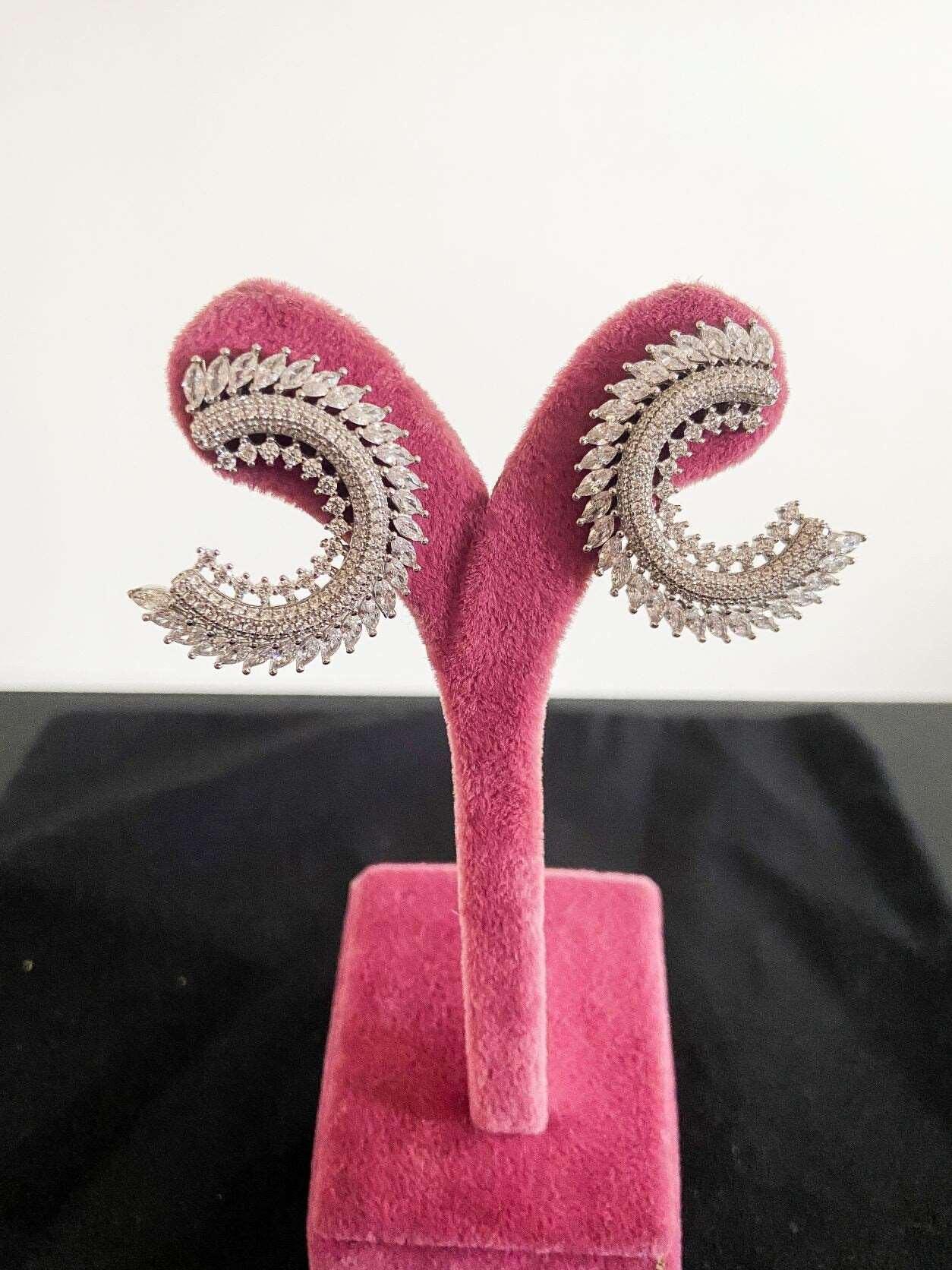 CC Silver Stud Earrings, 925 Sterling Silver CC Baguette Earrings, HanCC Silver Earrings Adorned with premium quality stones. These earrings, which are made of first quality using special zircon stones brought from Italy, are designed CC Silver Stud Earrings