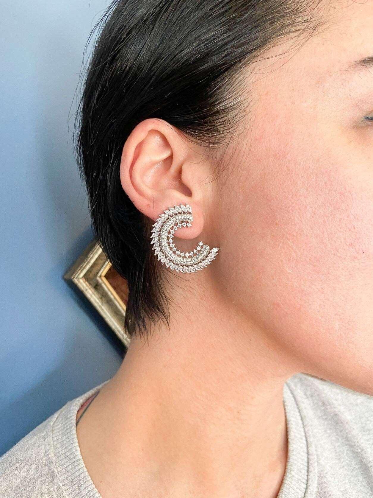 CC Silver Stud Earrings, 925 Sterling Silver CC Baguette Earrings, HanCC Silver Earrings Adorned with premium quality stones. These earrings, which are made of first quality using special zircon stones brought from Italy, are designed CC Silver Stud Earrings