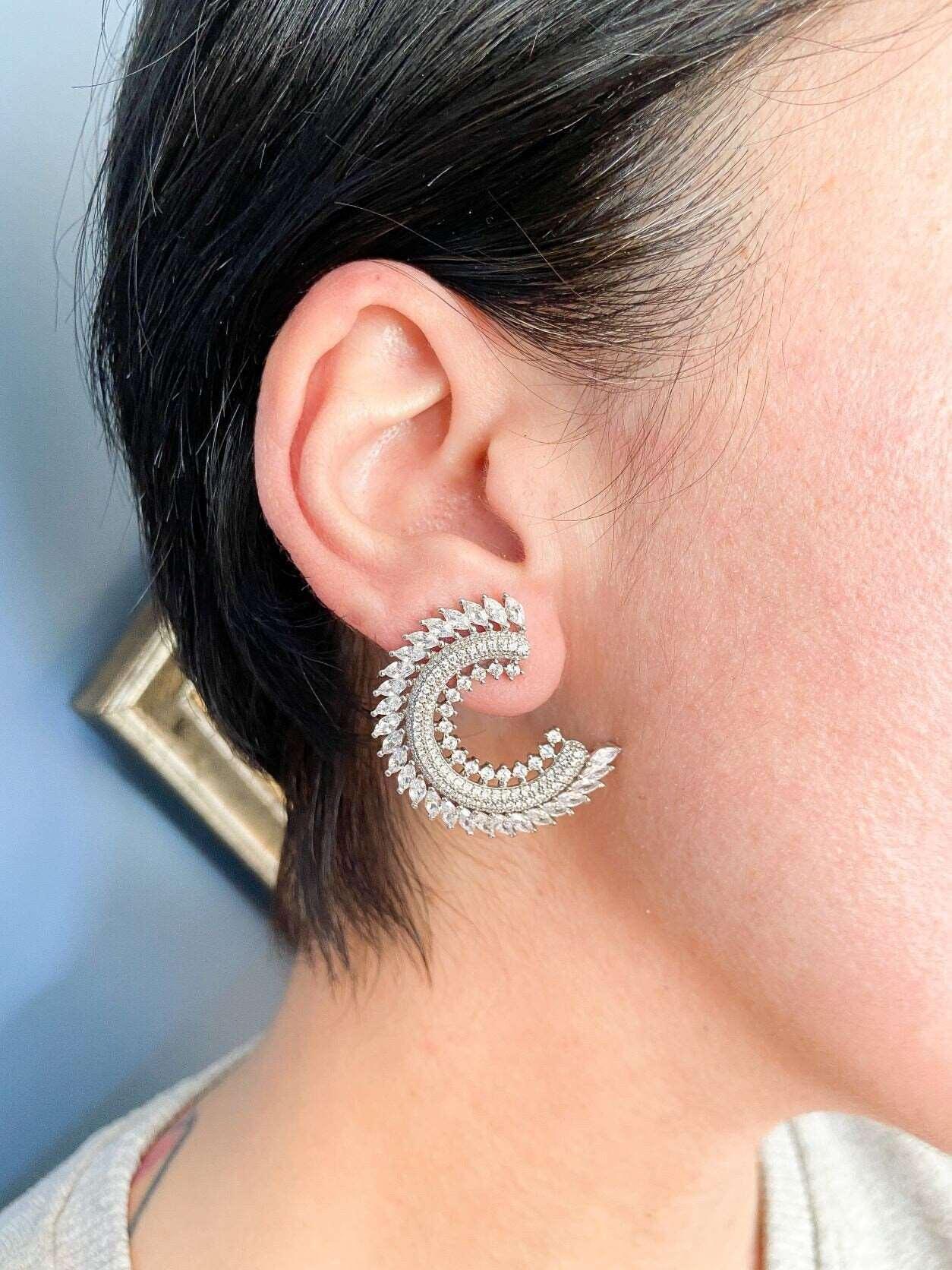 CC Silver Stud Earrings, 925 Sterling Silver CC Baguette Earrings, HanCC Silver Earrings Adorned with premium quality stones. These earrings, which are made of first quality using special zircon stones brought from Italy, are designed CC Silver Stud Earrings