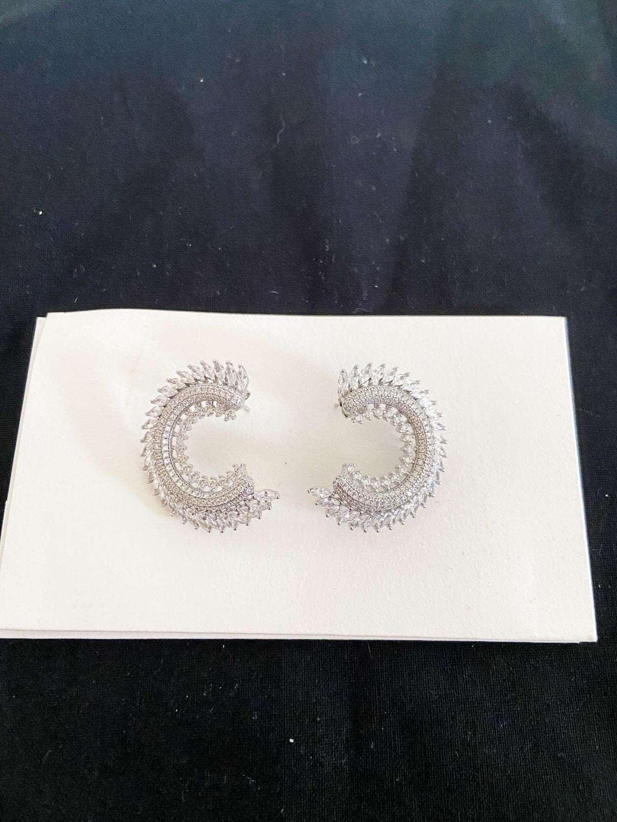CC Silver Stud Earrings, 925 Sterling Silver CC Baguette Earrings, HanCC Silver Earrings Adorned with premium quality stones. These earrings, which are made of first quality using special zircon stones brought from Italy, are designed CC Silver Stud Earrings