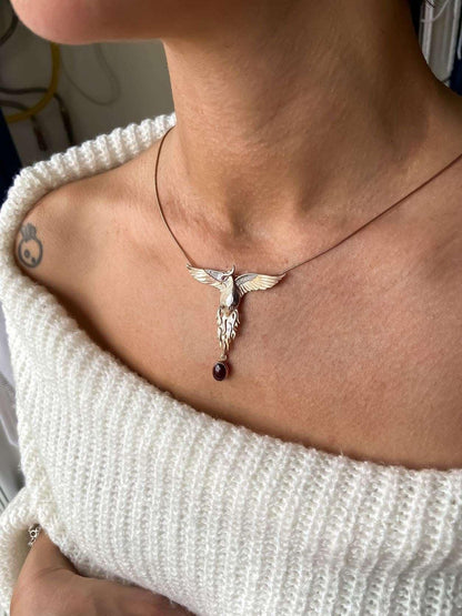 Garnet Stone Handmade Phoenix Root Ruby Eye Silver Necklace, Garnet GeGarnet Gemstone Our phoenix is ​​925 sterling silver and it is completely handcrafted. The eyes you see on it are decorated with red ruby. It is specially designed tNecklaceGarnet Stone