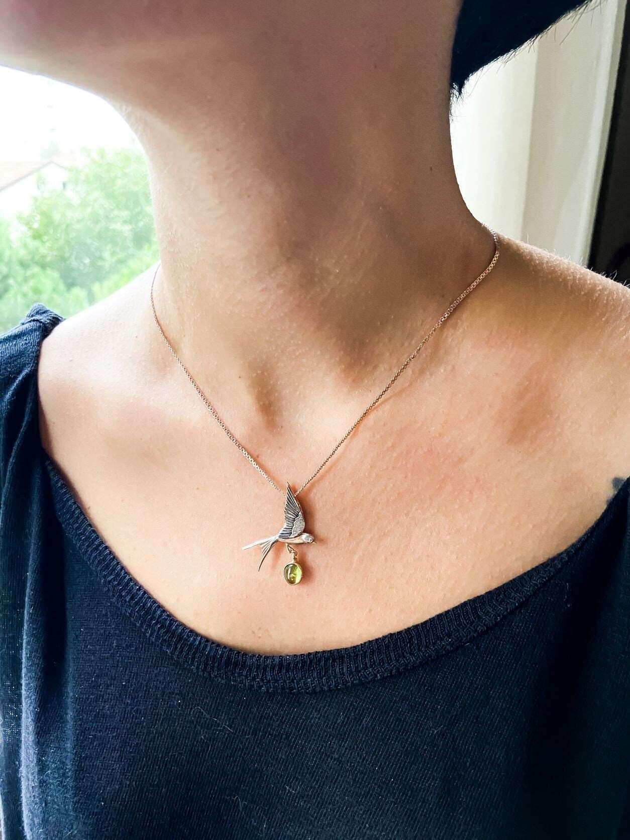 Handmade Peridot Swallow Bird Necklace, 925 Sterling Silver Swallow PePeridot Stone Our sparrow bird Necklace. Designs were designed by our design team. It is completely handcrafted by our craftsmen. These completely special design penHandmade Peridot Swallow Bird Necklace