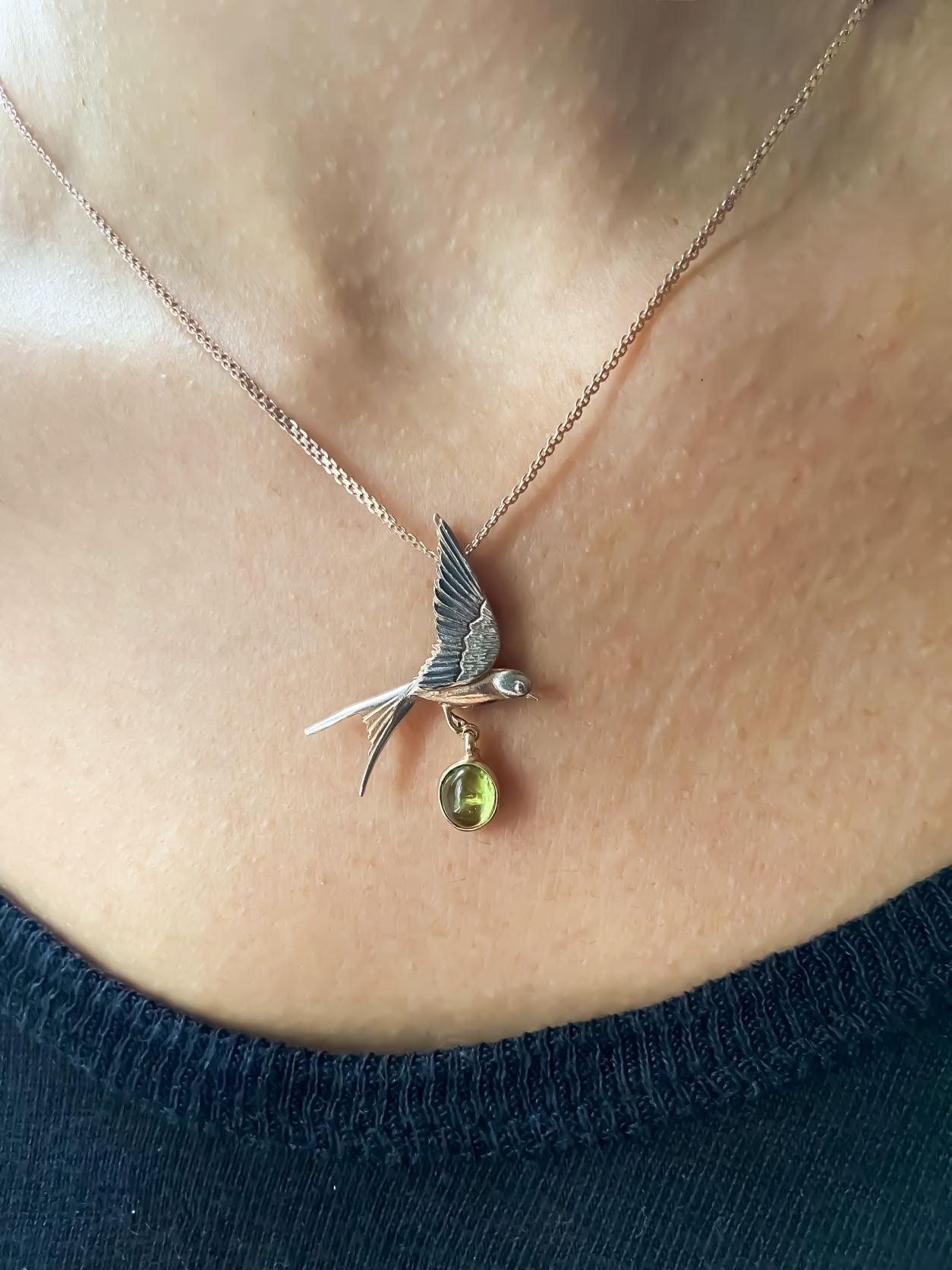 Handmade Peridot Swallow Bird Necklace, 925 Sterling Silver Swallow PePeridot Stone Our sparrow bird Necklace. Designs were designed by our design team. It is completely handcrafted by our craftsmen. These completely special design penHandmade Peridot Swallow Bird Necklace
