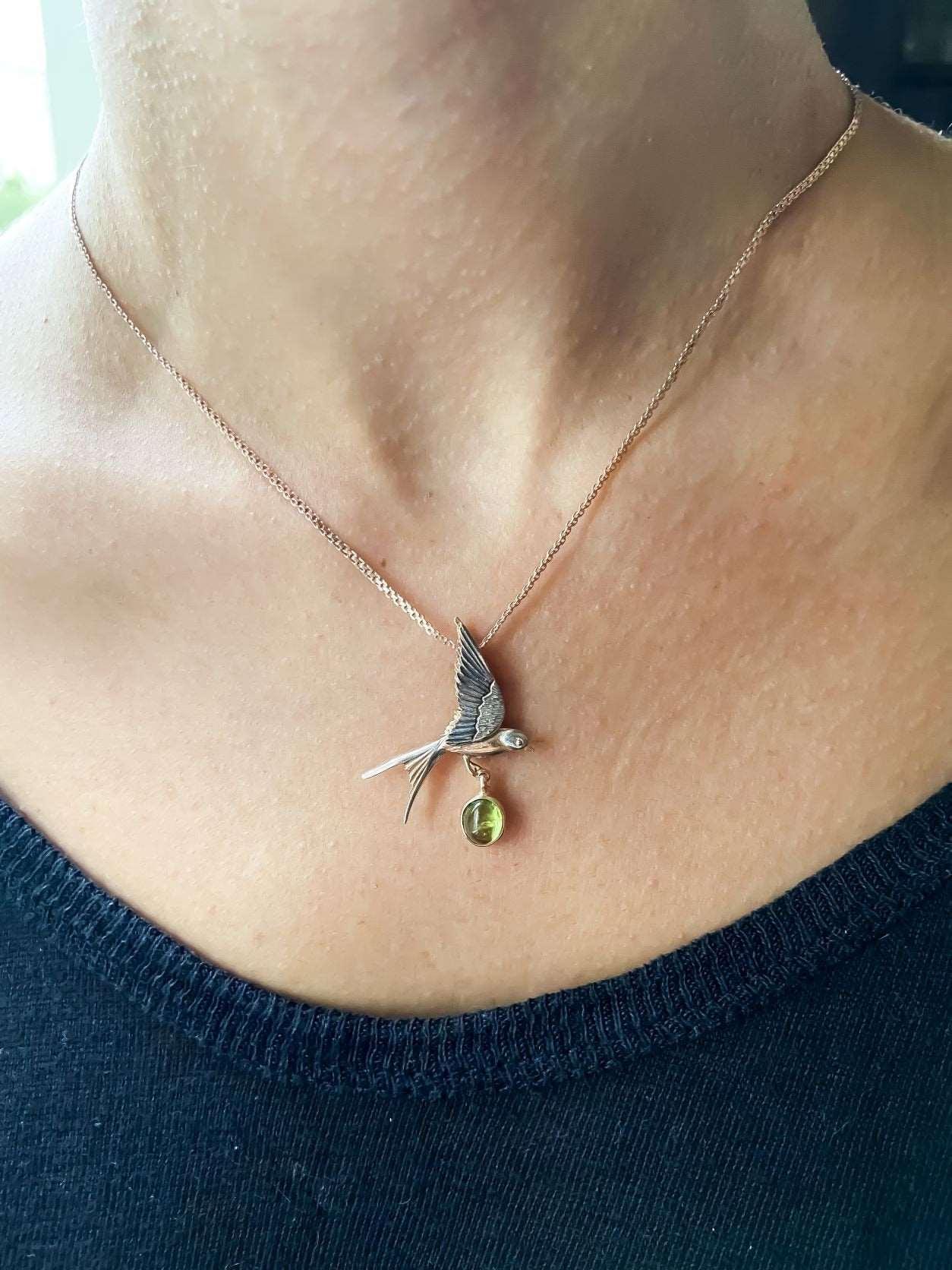 Handmade Peridot Swallow Bird Necklace, 925 Sterling Silver Swallow PePeridot Stone Our sparrow bird Necklace. Designs were designed by our design team. It is completely handcrafted by our craftsmen. These completely special design penHandmade Peridot Swallow Bird Necklace