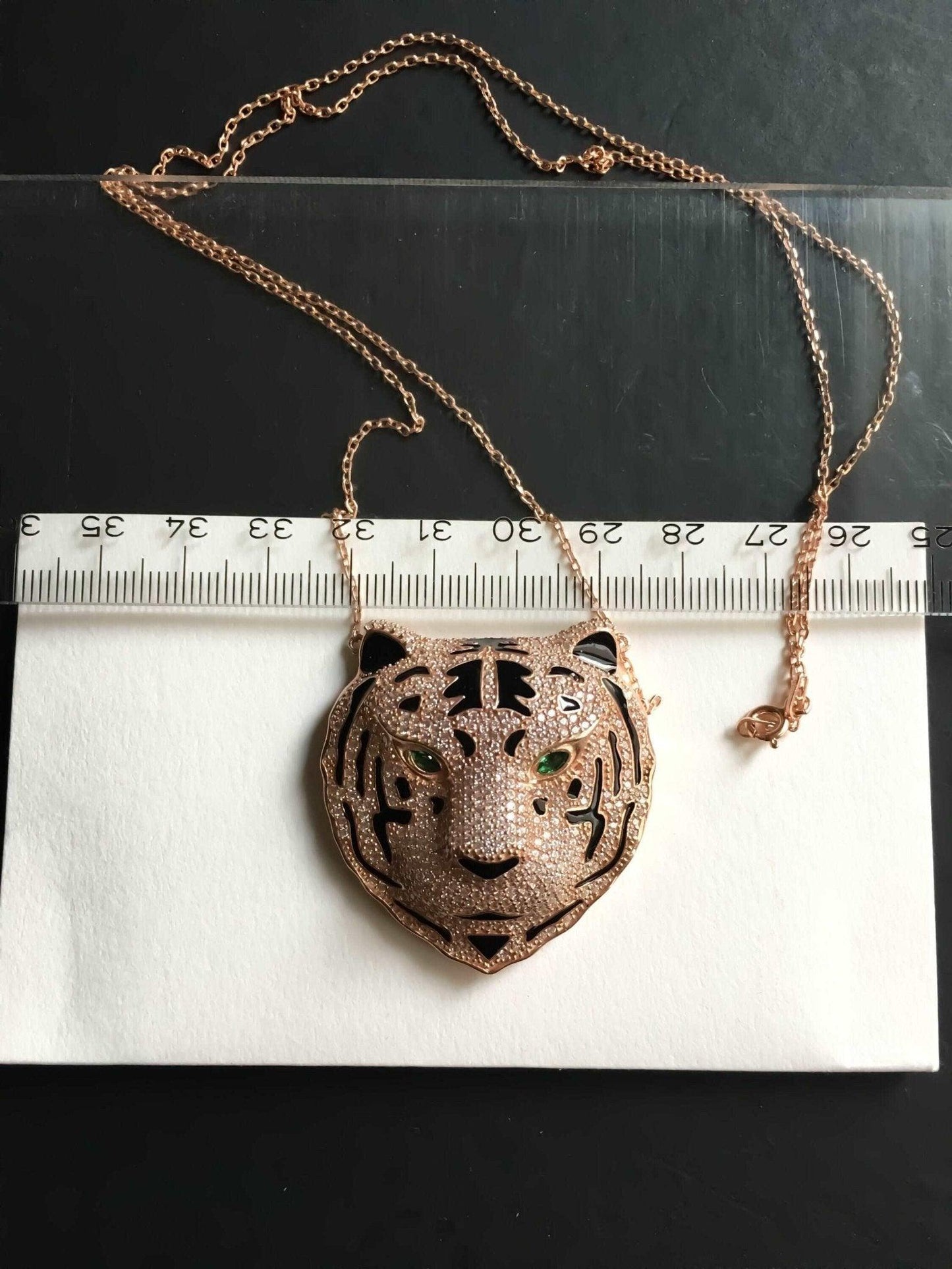 Leopard Head Emerald Eye Nacre Working Necklace,  Unique Desing HandmaOur Leopard Head is 925 sterling silver and it is completely handcrafted.Stone is zircon gemstone.
Eyes is Emerald. Nacre Working Handmade Study. Design production aLeopard Head Emerald Eye