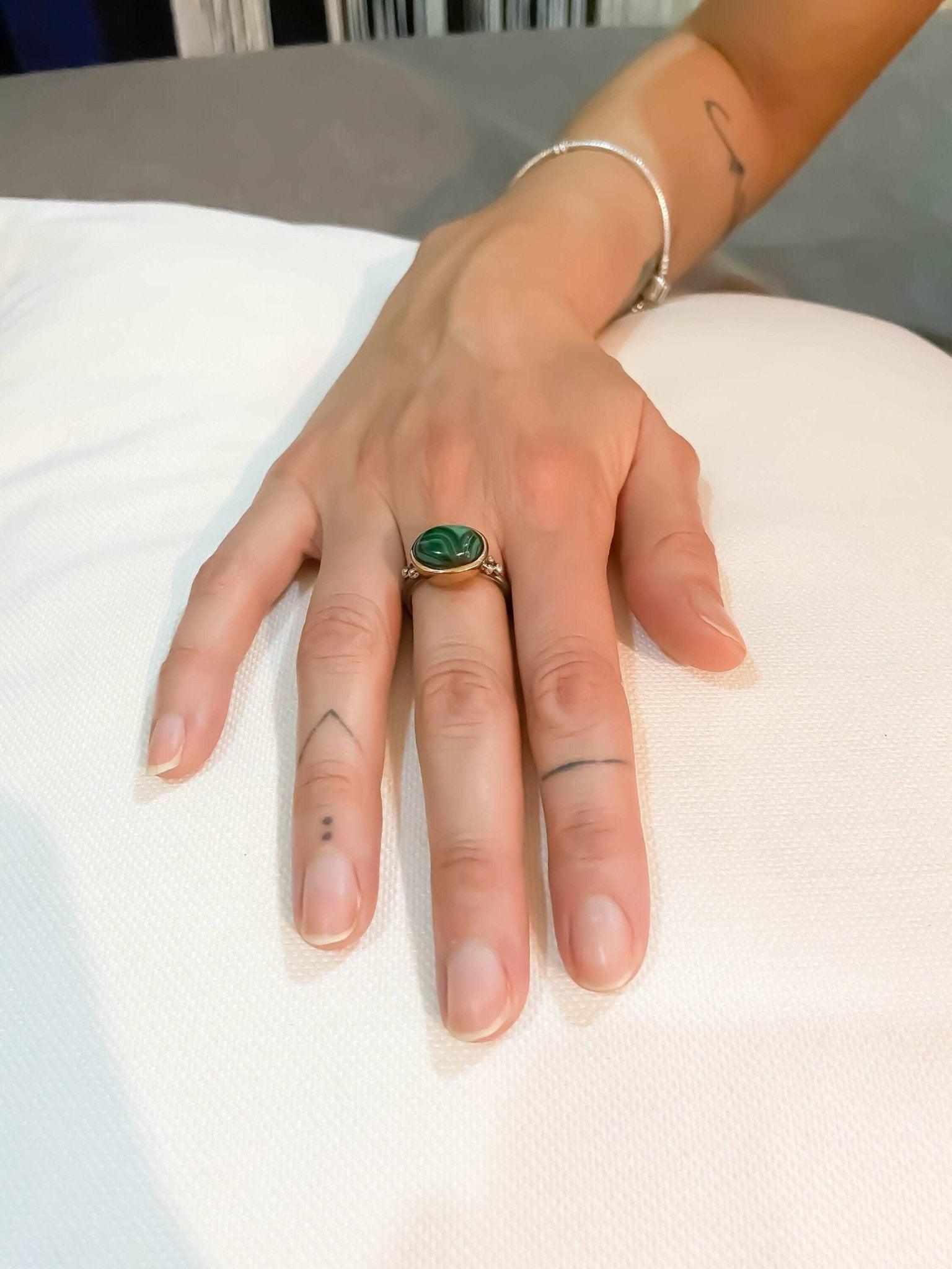 Malachite Natural Stone Ring, 925 Sterling Silver Malachite Green RingMalachite stone desing women's ring made with 925 sterling hand workmanship.it is completely handcrafted and design. Stone cutting and all our equipment used are firMalachite Natural Stone Ring