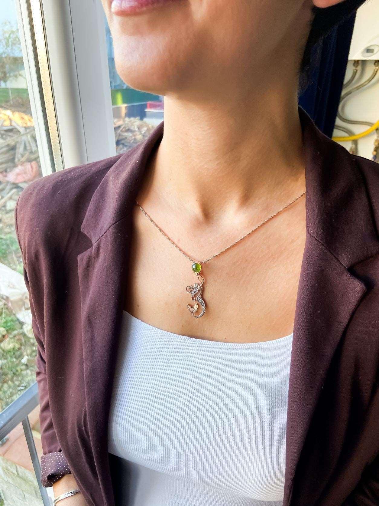 Mermaid First Quality Peridot Natural Stone 925 Sterling Silver NecklaMermaid peridot pendant Necklace. Designs were designed by our design team. It is completely handcrafted by our craftsmen. These completely special design earrings aMermaid First Quality Peridot