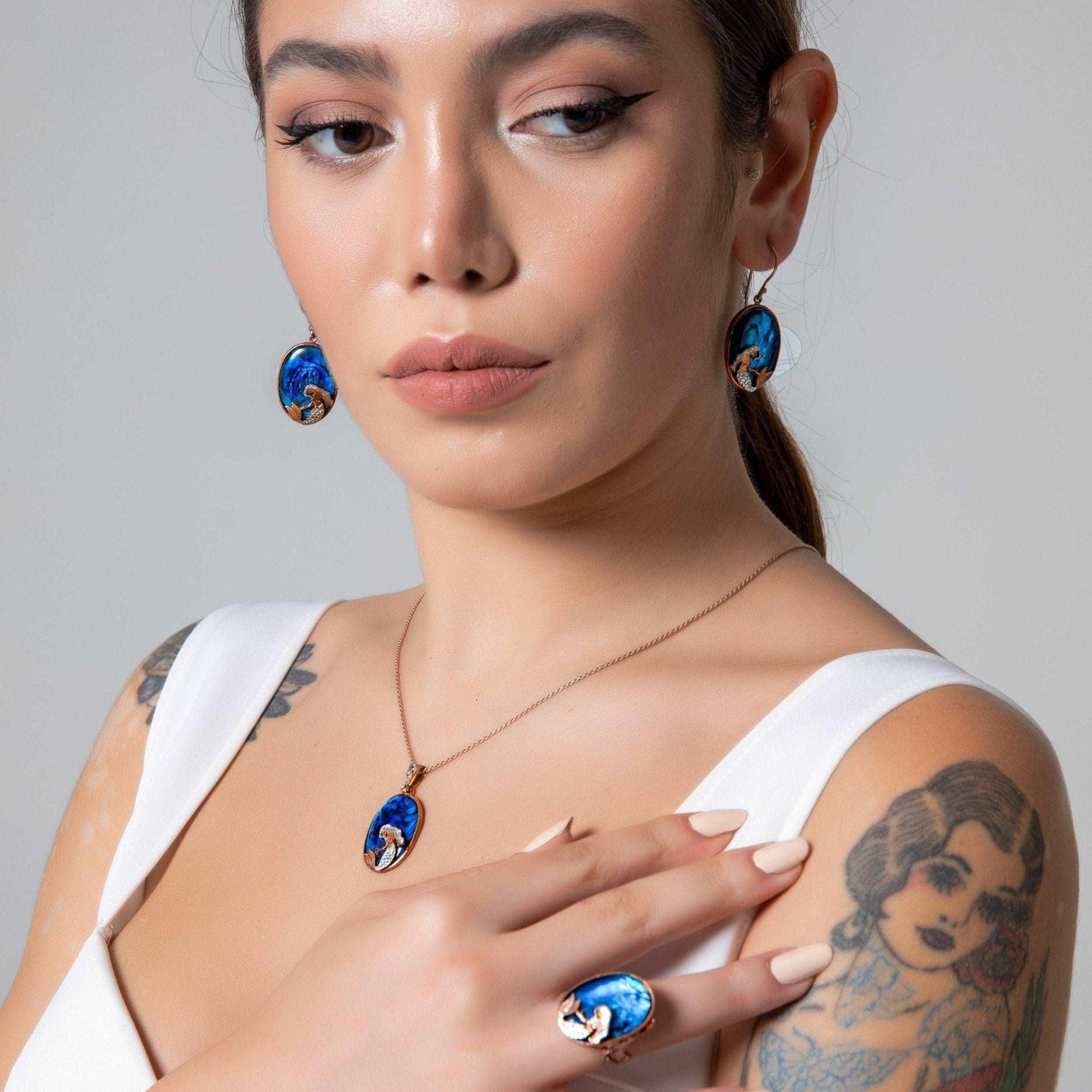 Mermaid Jewelry Abalone shell stone Necklace, Mermaid Deep Ocean WaterThe mermaid figure is engraved on deep water ocean blue theme blue Abalone stone 925 sterling sterling silver and complety Handmade, decorated with abalone shell stoMermaid Jewelry