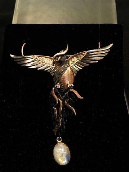 Moonstone Rose Gold Handmade Phoenix Necklace, Jewerly Firebird MoonstOur phoenix is ​​925 sterling silver and it is completely handcrafted. The eyes you see on it are decorated with emeralds.the stone under it is moonstone. It is specMoonstone Rose Gold