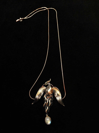 Moonstone Rose Gold Handmade Phoenix Necklace, Jewerly Firebird MoonstOur phoenix is ​​925 sterling silver and it is completely handcrafted. The eyes you see on it are decorated with emeralds.the stone under it is moonstone. It is specMoonstone Rose Gold