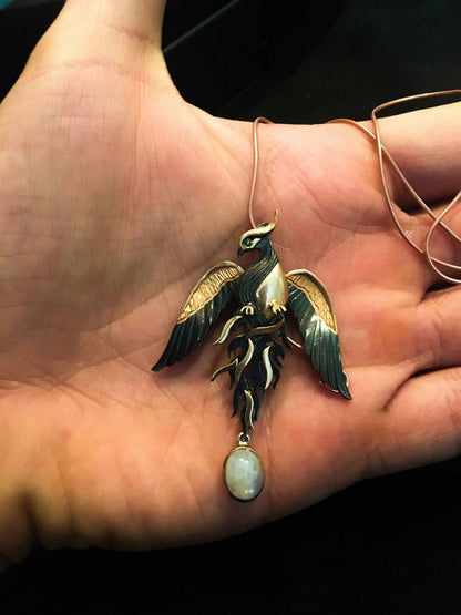 Moonstone Rose Gold Handmade Phoenix Necklace, Jewerly Firebird MoonstOur phoenix is ​​925 sterling silver and it is completely handcrafted. The eyes you see on it are decorated with emeralds.the stone under it is moonstone. It is specMoonstone Rose Gold