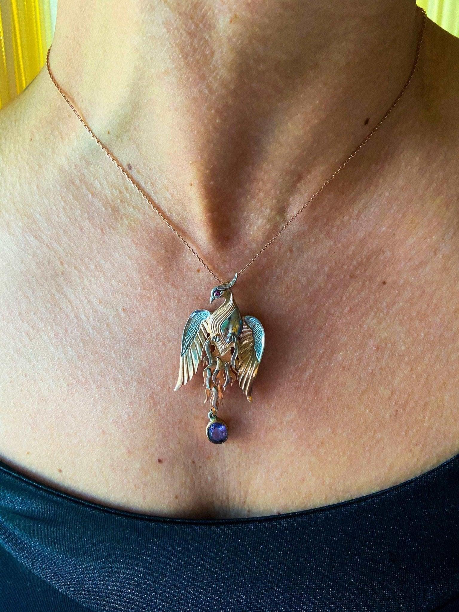 Phoenix Strength Amethyst Stone Firebird 925 Sterling Silver Pendant, Amethyst Gemstone Our phoenix is ​​925 sterling silver and it is completely handcrafted. The eyes you see on it are decorated with red ruby. It is specially designedNecklacePhoenix Strength Amethyst