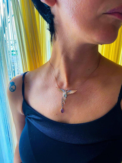 Phoenix Strength Amethyst Stone Firebird 925 Sterling Silver Pendant, Amethyst Gemstone Our phoenix is ​​925 sterling silver and it is completely handcrafted. The eyes you see on it are decorated with red ruby. It is specially designedNecklacePhoenix Strength Amethyst
