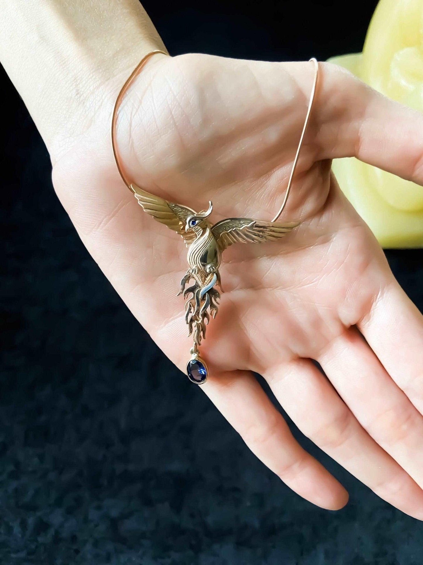Phoenix Strength Sapphire Stone Firebird 925 Sterling Silver Pendant, Sapphire Gemstone Our phoenix is ​​925 sterling silver and it is completely handcrafted. The eyes you see on it are decorated with Blue sapphire. It is specially desPhoenix Strength Sapphire Stone