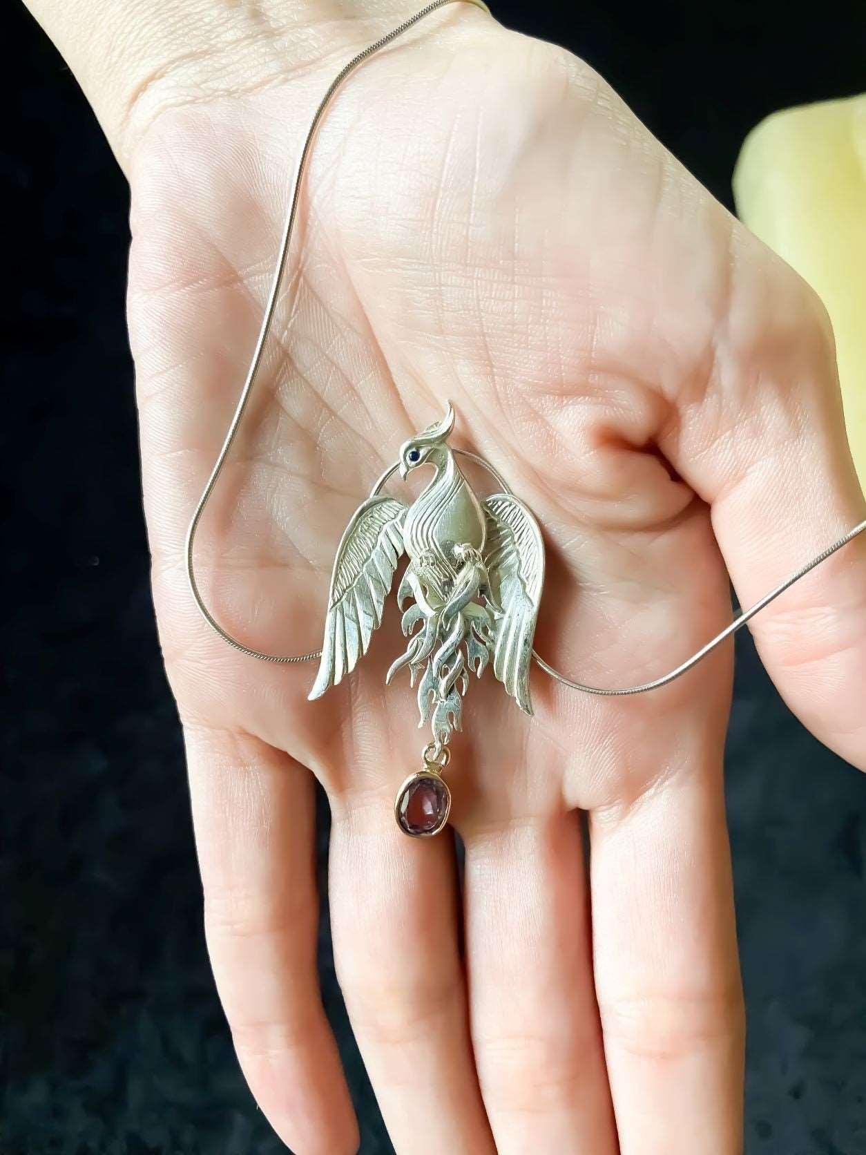 Pure Silver Firebird Strength Phoenix 925 Sterling Silver Necklace, HaAmethyst Stone Sapphire Eye Pure Silver Our phoenix is ​​925 sterling silver and it is completely handcrafted. The eyes you see on it are decorated with Blue sapphirPure Silver Firebird