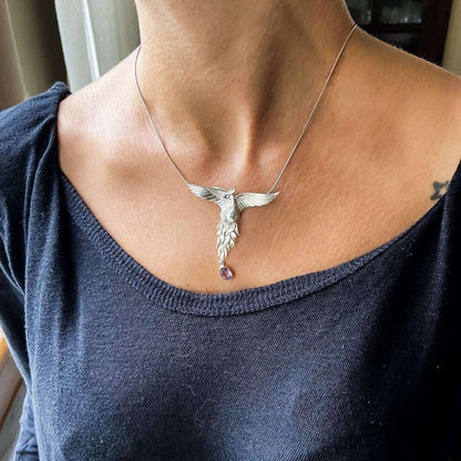 Pure Silver Firebird Strength Phoenix 925 Sterling Silver Necklace, HaAmethyst Stone Sapphire Eye Pure Silver Our phoenix is ​​925 sterling silver and it is completely handcrafted. The eyes you see on it are decorated with Blue sapphirPure Silver Firebird