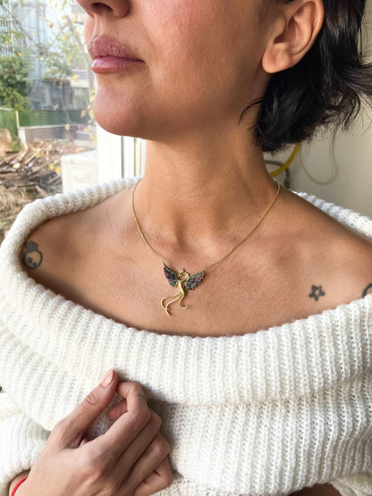 Rainbow Phoenix Gold Planet Necklace 925 Sterling Silver, Custom DesinWe designed our 925 sterling silver firebird necklace for you. It is completely handcrafted and made of sterling silver. It is decorated with gold planet and coloredNecklaceRainbow Phoenix Gold Planet Necklace