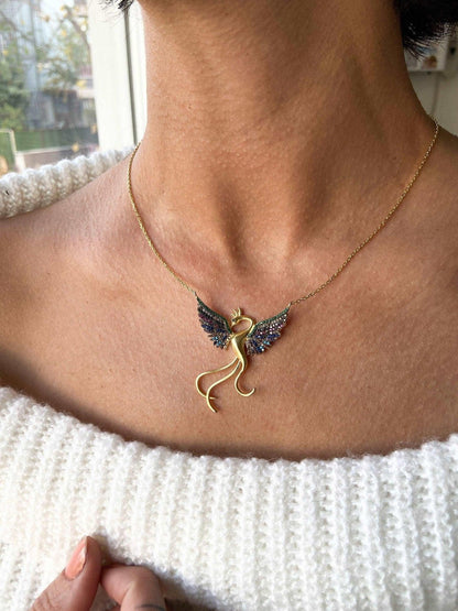 Rainbow Phoenix Gold Planet Necklace 925 Sterling Silver, Custom DesinWe designed our 925 sterling silver firebird necklace for you. It is completely handcrafted and made of sterling silver. It is decorated with gold planet and coloredNecklaceRainbow Phoenix Gold Planet Necklace