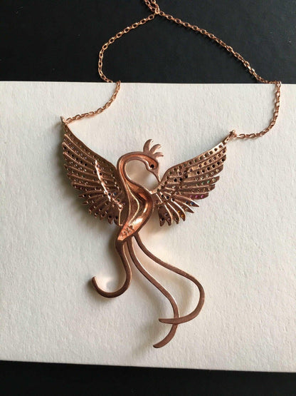 Rainbow Phoenix Necklace,Custom Desing Firebird Handmade Jewelry StrenWe designed our 925 carat fire bird necklace for you. It is completely handcrafted and made of sterling silver. It is decorated with rose gold and colored zircon stoRainbow Phoenix Necklace