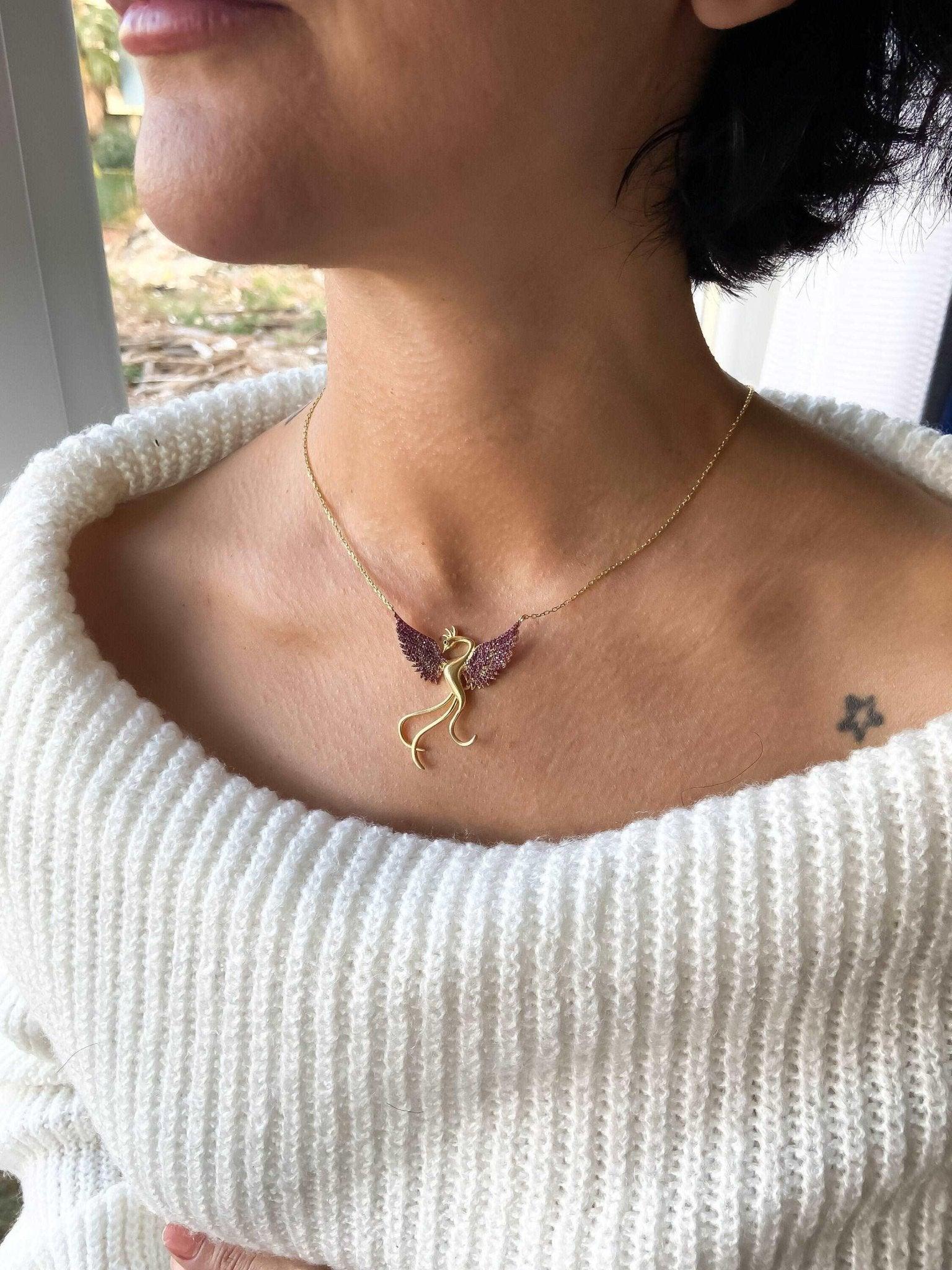 Red Phoenix Gold Planet Handmade Necklace, Gold Firebird 925 Sterling We designed our 925 carat fire bird necklace for you. It is completely handcrafted and made of sterling silver. It is decorated with Gold Planet and Red colored zircNecklaceRed Phoenix Necklace