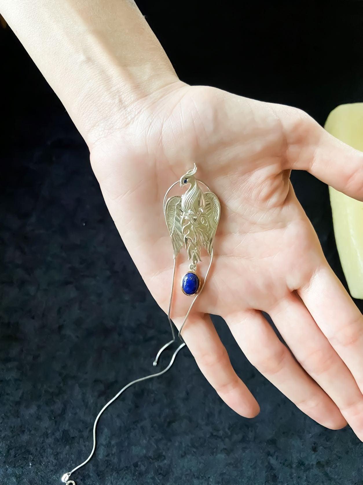 Silver Lapis Lazuli Phoenix Strength Necklace, Sapphire Stone or Root Lapis Lazuli Stone Sapphire or Root Ruby Eyes Pure Silver Our phoenix is ​​925 sterling silver and it is completely handcrafted. The eyes you see on it are decoratedSilver Lapis Lazuli