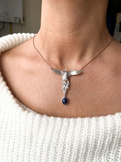 Silver Lapis Lazuli Phoenix Strength Necklace, Sapphire Stone or Root Lapis Lazuli Stone Sapphire or Root Ruby Eyes Pure Silver Our phoenix is ​​925 sterling silver and it is completely handcrafted. The eyes you see on it are decoratedSilver Lapis Lazuli