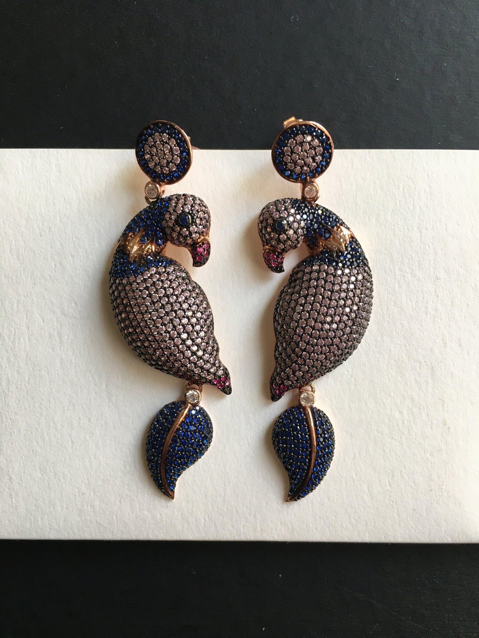Silver Parrot Stud Earrings, Desing Parrot Colored Handmade Earrings, Custom Desing Colored Parrot is 925 sterling silver Earrings and it is completely handcrafted.Stone is zircon gemstone.The stones on it are first quality zircon.cuttSilver Parrot Stud Earrings