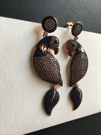 Silver Parrot Stud Earrings, Desing Parrot Colored Handmade Earrings, Custom Desing Colored Parrot is 925 sterling silver Earrings and it is completely handcrafted.Stone is zircon gemstone.The stones on it are first quality zircon.cuttSilver Parrot Stud Earrings