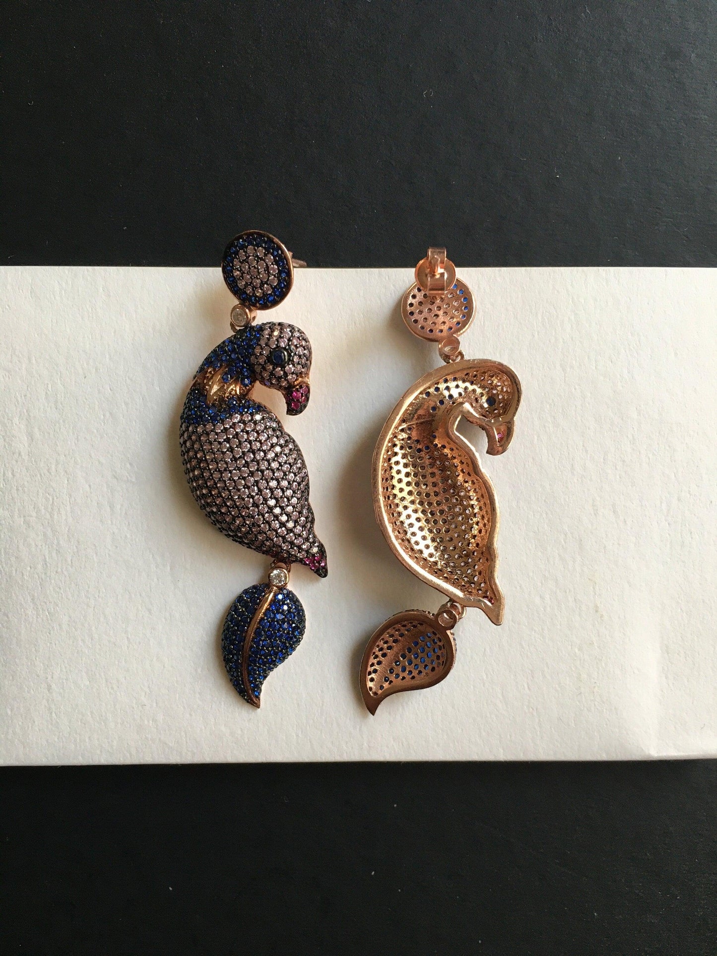 Silver Parrot Stud Earrings, Desing Parrot Colored Handmade Earrings, Custom Desing Colored Parrot is 925 sterling silver Earrings and it is completely handcrafted.Stone is zircon gemstone.The stones on it are first quality zircon.cuttSilver Parrot Stud Earrings