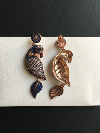 Silver Parrot Stud Earrings, Desing Parrot Colored Handmade Earrings, Custom Desing Colored Parrot is 925 sterling silver Earrings and it is completely handcrafted.Stone is zircon gemstone.The stones on it are first quality zircon.cuttSilver Parrot Stud Earrings