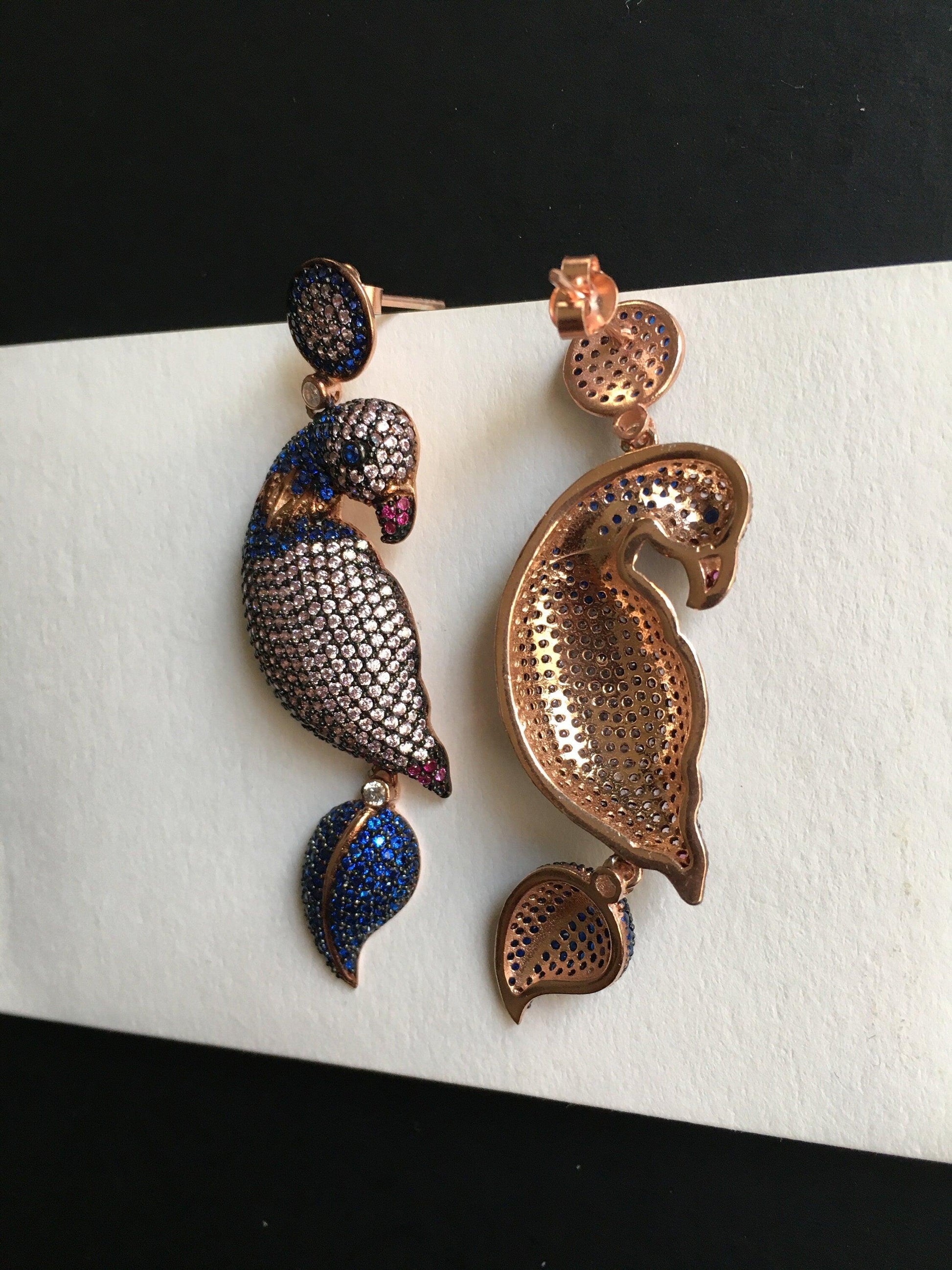 Silver Parrot Stud Earrings, Desing Parrot Colored Handmade Earrings, Custom Desing Colored Parrot is 925 sterling silver Earrings and it is completely handcrafted.Stone is zircon gemstone.The stones on it are first quality zircon.cuttSilver Parrot Stud Earrings